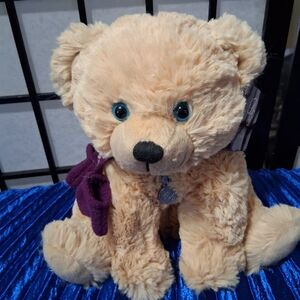 Cuddly Tan Teddy Bear with Purple Bow